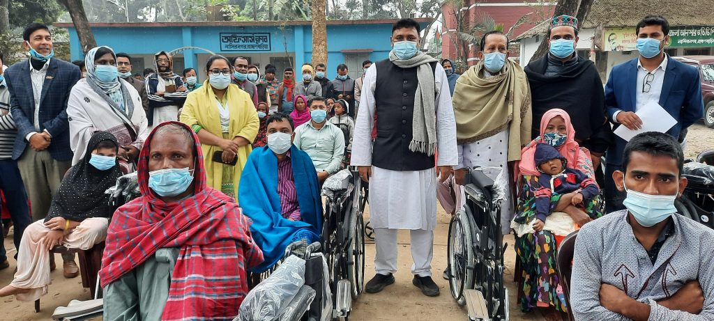 নাসিরনগরে প্রতিবন্ধীদের মাঝে হুইল চেয়ার বিতরণ